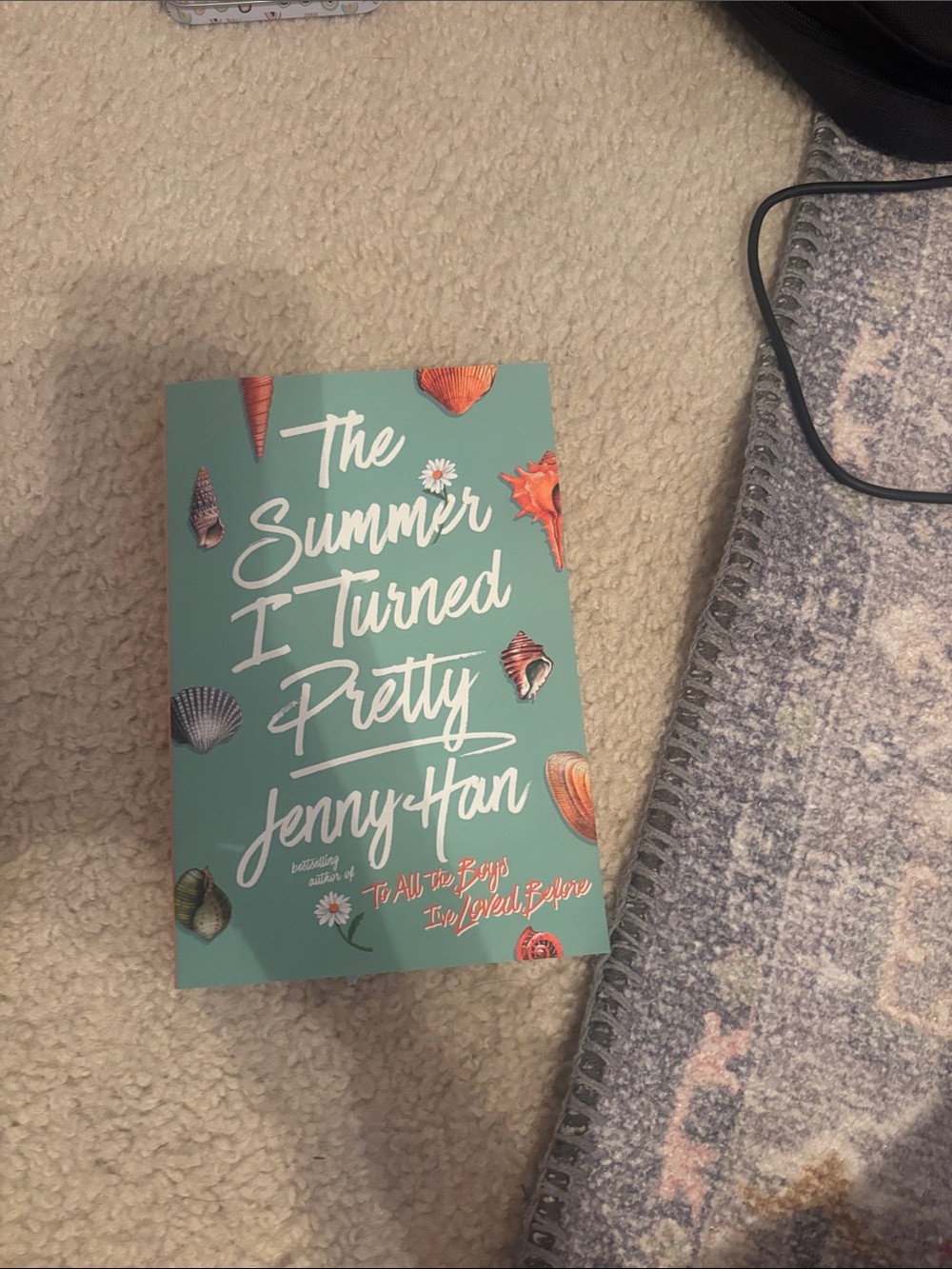 & Other Stories Teal Book Cover with Coral Shell Accents